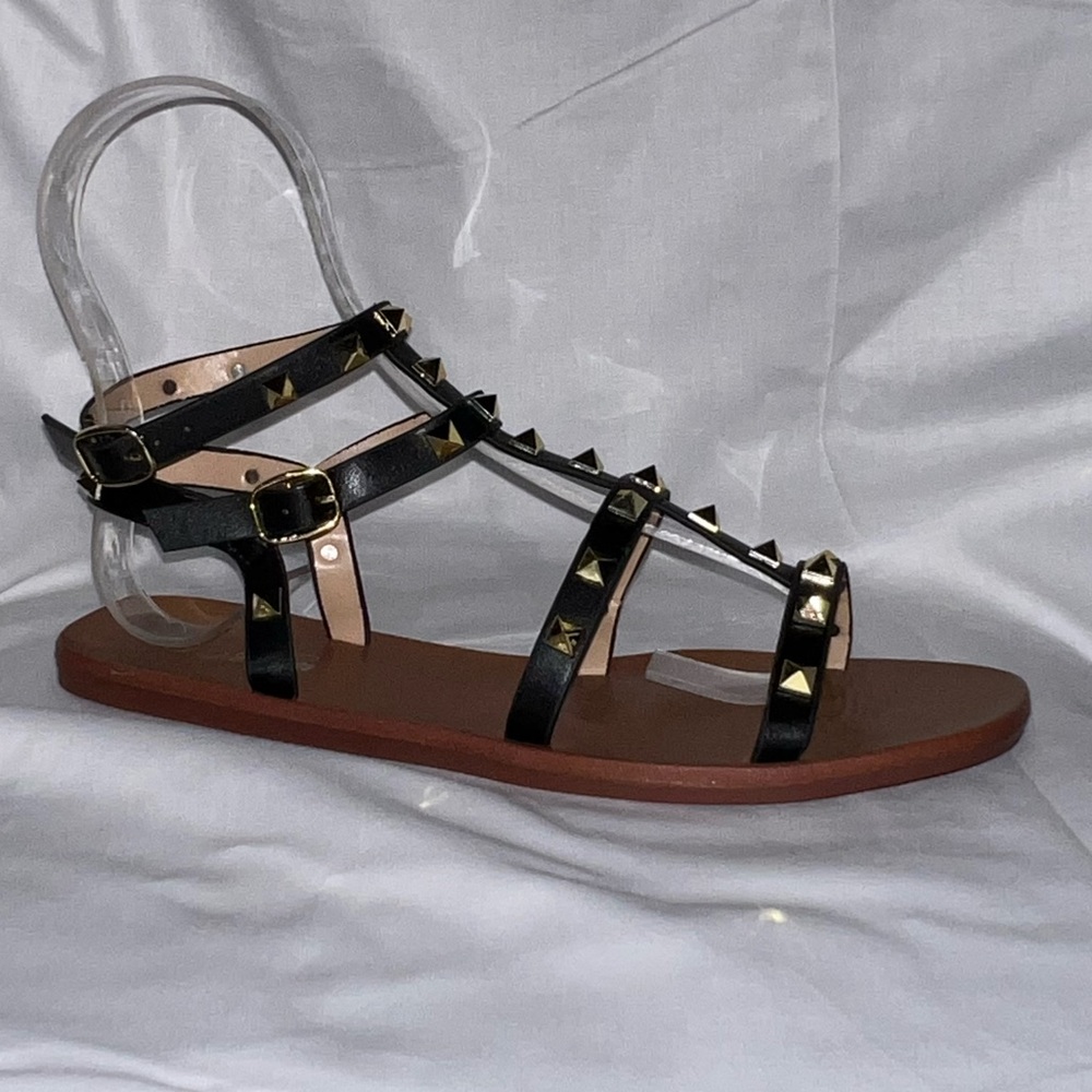 Black sandals with gold studs